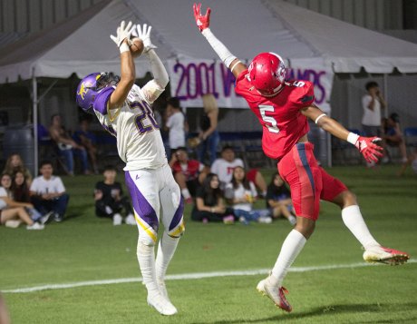 Tiger football team rebounds from Clovis West loss with impressive 42-18 victory over Sanger Apaches Tiger strong safety Jarrick Lewis intercepted this pass in the end zone.